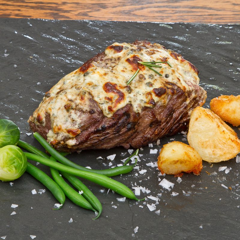 Whole Ostrich Fillet Roast With Blue Cheese and Peppercorn Topping